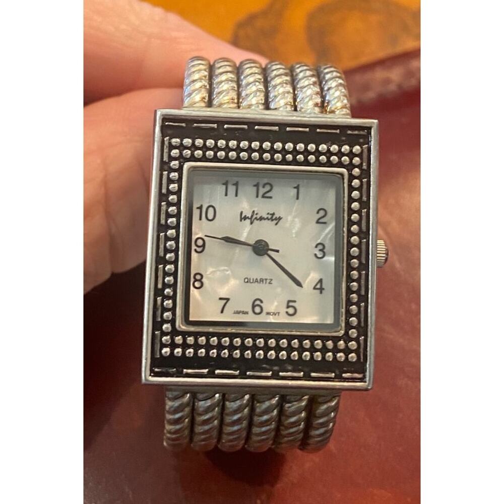 Women's 27mm Silver Tone Infinity Watch, MOP Face, Bangle
